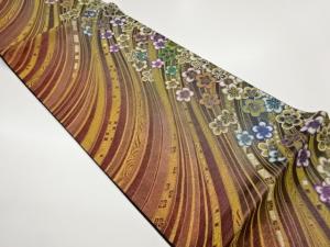 曲線に梅尽くし模様織出し袋帯